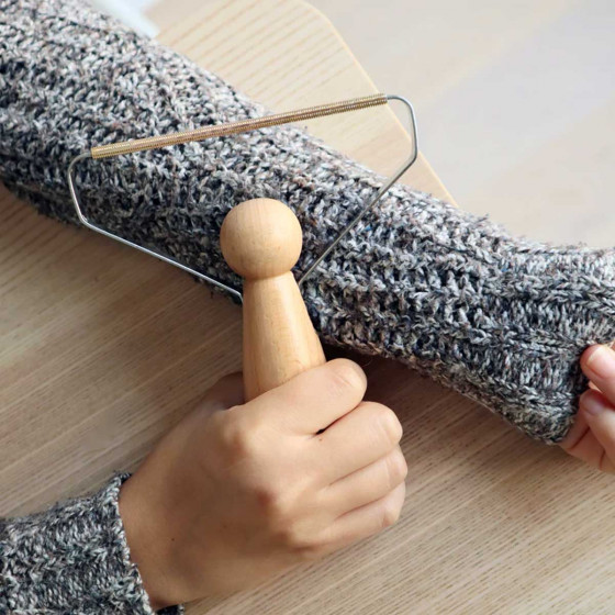 Rasoir anti bouloches pour vêtements