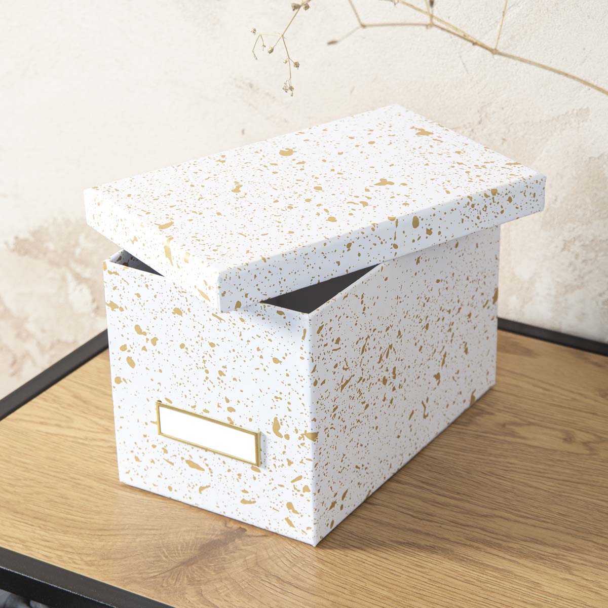 Boîte à CD blanche et dorée